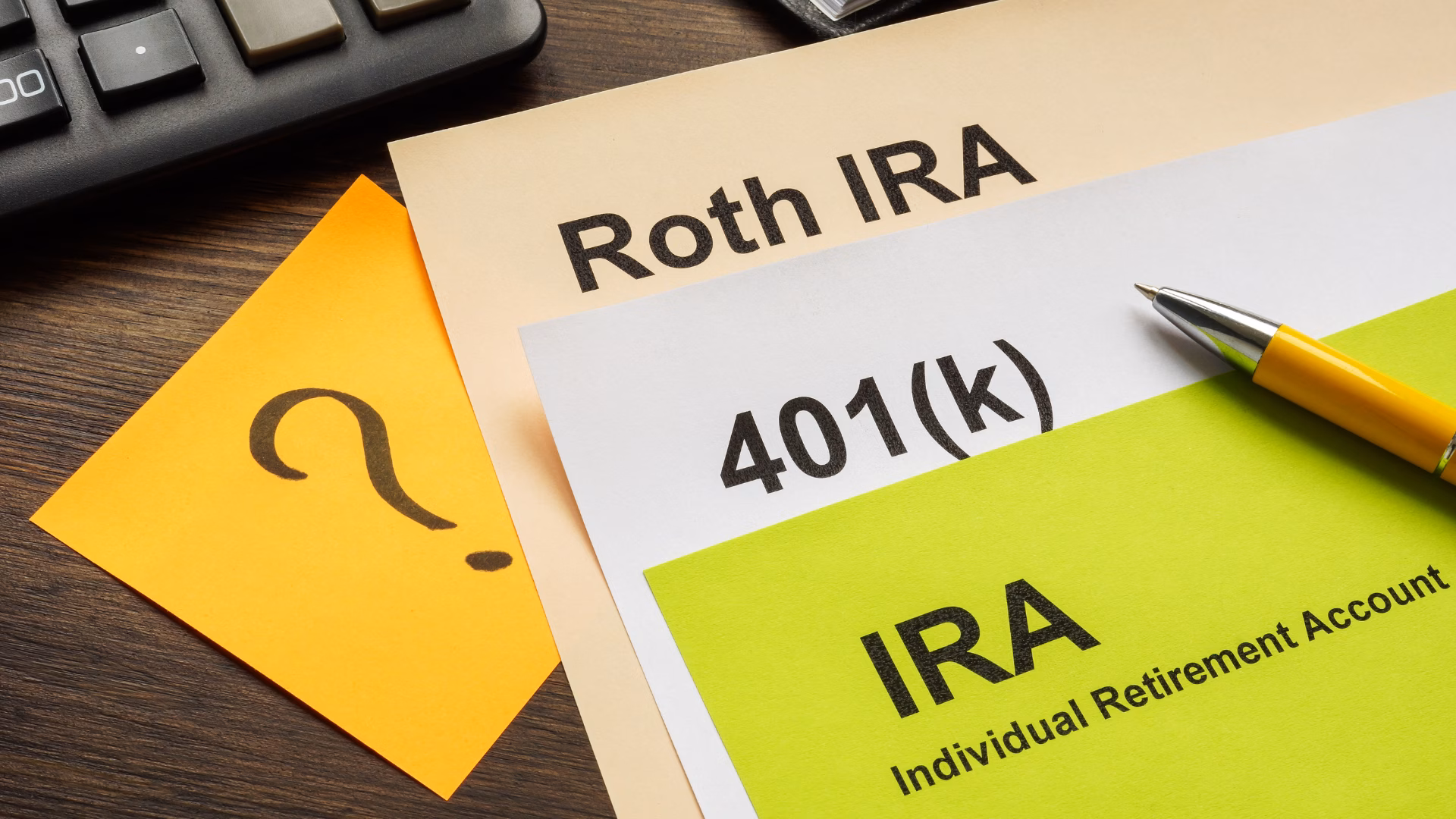 Certificates & IRAs - IRAs Roth IRA paperwork with a pen on it.